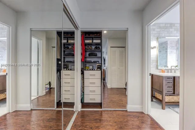 a bedroom with bed and a window