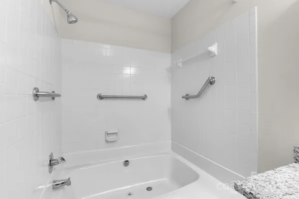 a bathroom with a bathtub