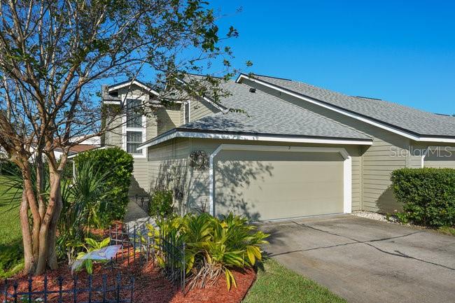 2 Misners Trail Ormond Beach, FL 32174 - Photo 1 of 44 a front view of a house with a yard