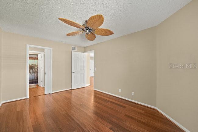 2 Misners Trail Ormond Beach, FL 32174 - Photo 15 of 44 a view of an empty room with wooden floor