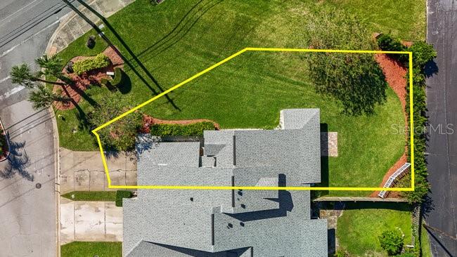 2 Misners Trail Ormond Beach, FL 32174 - Photo 2 of 44 a view of a swimming pool with a garden