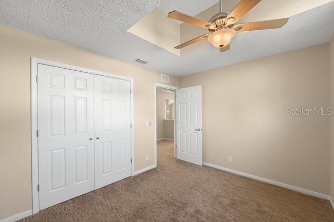 2 Misners Trail Ormond Beach, FL 32174 - Photo 22 of 44 an empty room with windows and fan