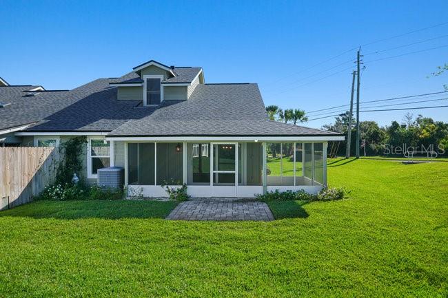 2 Misners Trail Ormond Beach, FL 32174 - Photo 3 of 44 a front view of a house with garden