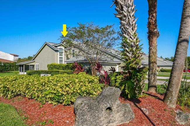 2 Misners Trail Ormond Beach, FL 32174 - Photo 33 of 44 a front view of a house with a garden