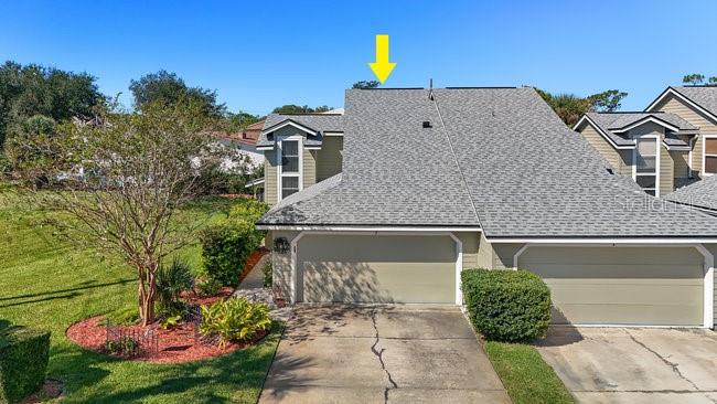 2 Misners Trail Ormond Beach, FL 32174 - Photo 6 of 44 a front view of a house with a yard