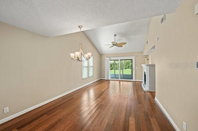 2 Misners Trail Ormond Beach, FL 32174 - Photo 9 of 44 wooden floor in an empty room with a window