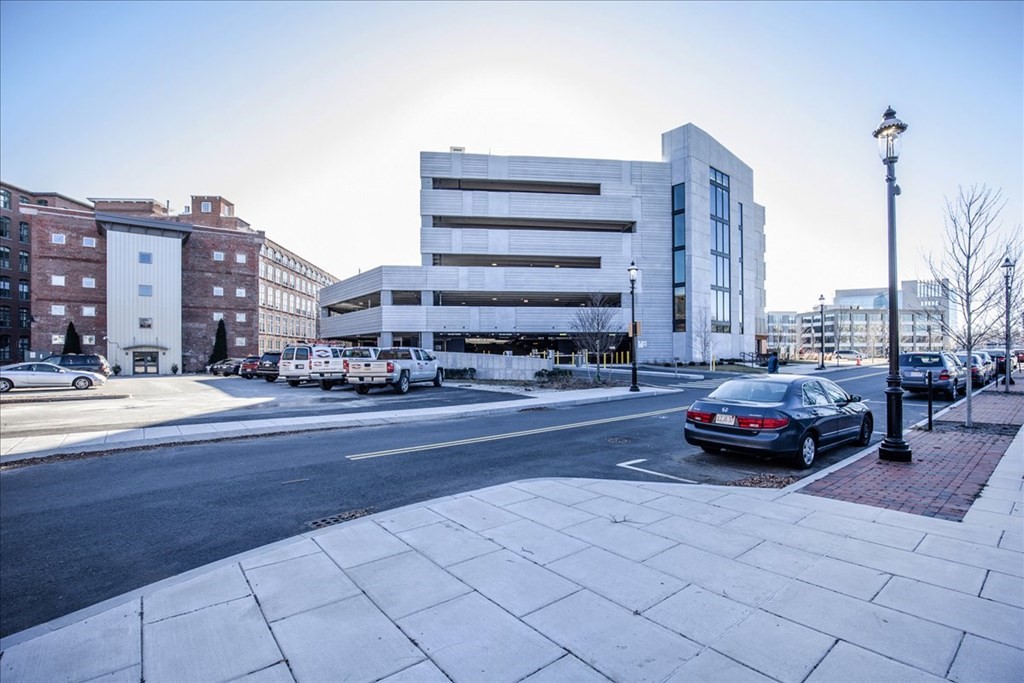 200 Market Street, Unit 3010 Lowell, MA 01852 - Photo 2 of 26 a view of street with cars