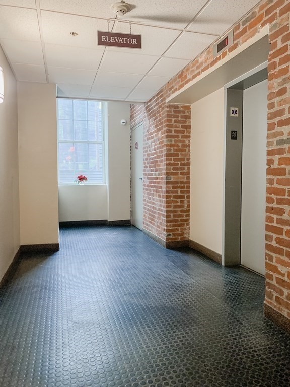 200 Market Street, Unit 3010 Lowell, MA 01852 - Photo 25 of 26 a view of an empty room with a window