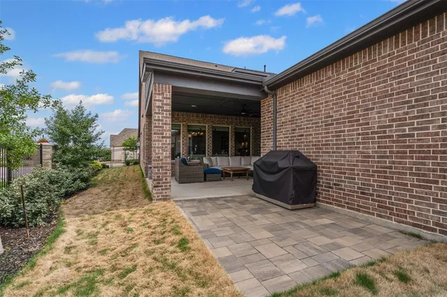 a backyard of a house with seating space
