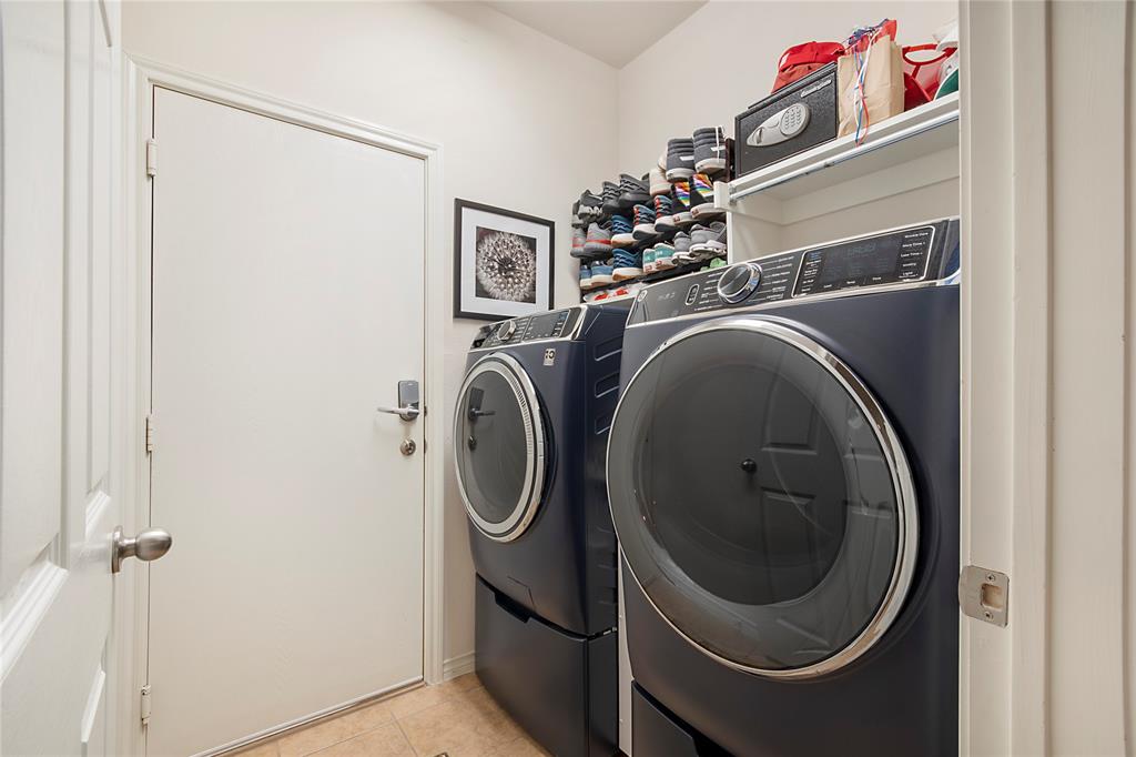 11601 Forestbrook Drive Frisco, TX 75035 - Photo 21 of 40 a utility room with dryer and washer