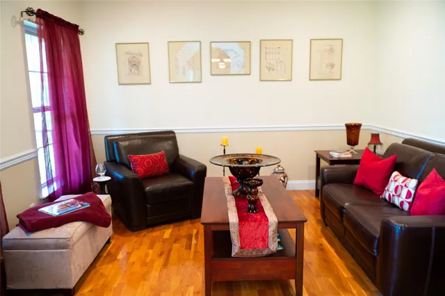 a living room with furniture and a couch