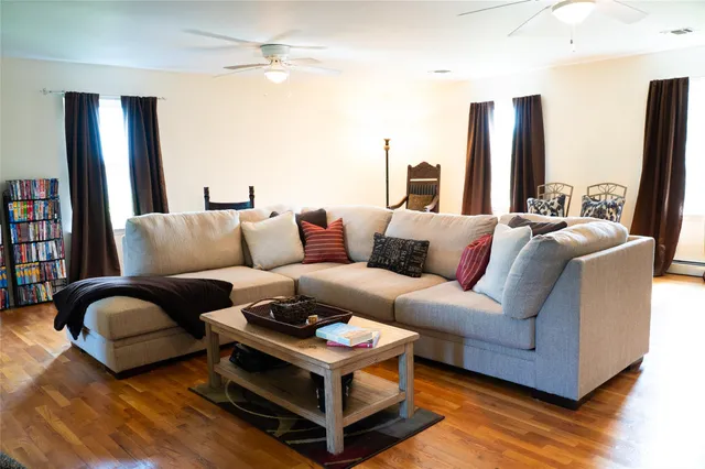 a living room with furniture and a couch