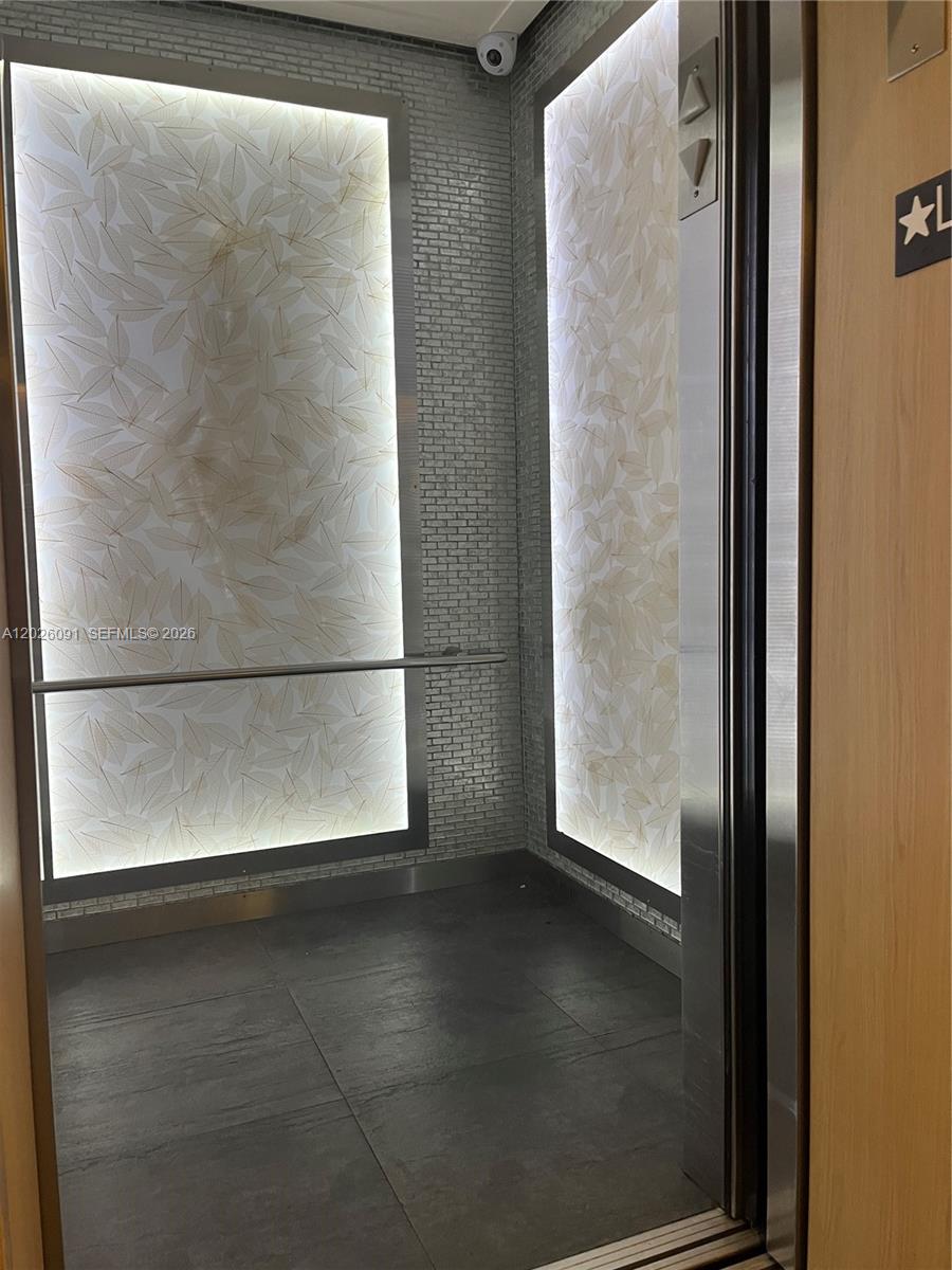 90 Southwest 3rd Street, Unit 1705 Miami, FL 33130 - Photo 26 of 33 a view of a glass door