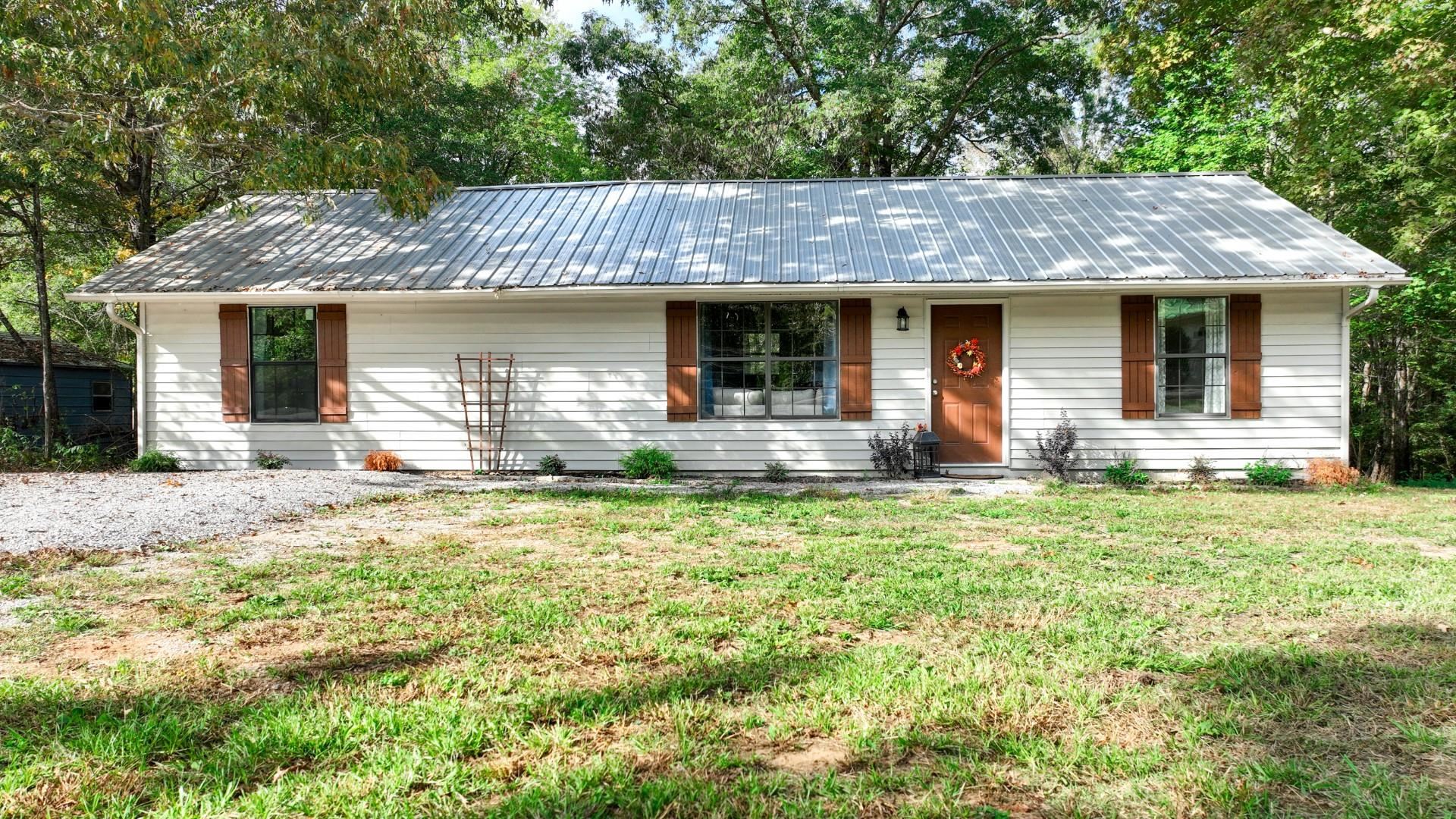 52 Cr 341 Road Iuka, MS 38852 - Photo 26 of 28 front view of a house with a yard