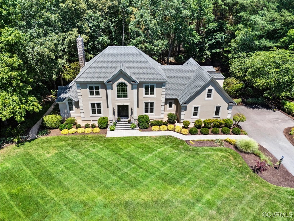 13500 Stonegate Road Midlothian, VA 23113 - Photo 46 of 47 a front view of house with yard and green space