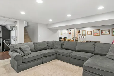 a living room with furniture and a couch