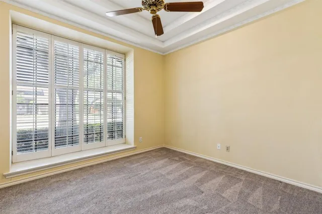 a view of an empty room and window