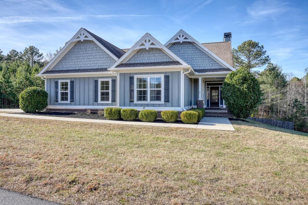 161 Loop Lane Blairsville, GA 30512 - Photo 1 of 67 a front view of a house with a yard and potted plants