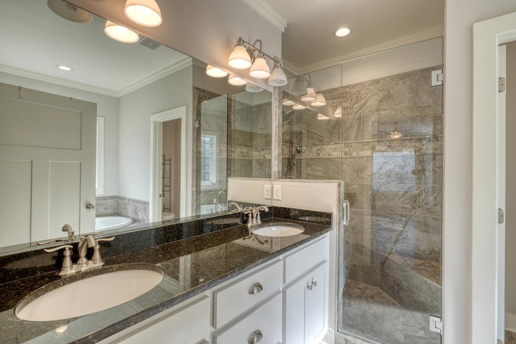 161 Loop Lane Blairsville, GA 30512 - Photo 16 of 67 a bathroom with a sink double vanity and a mirror