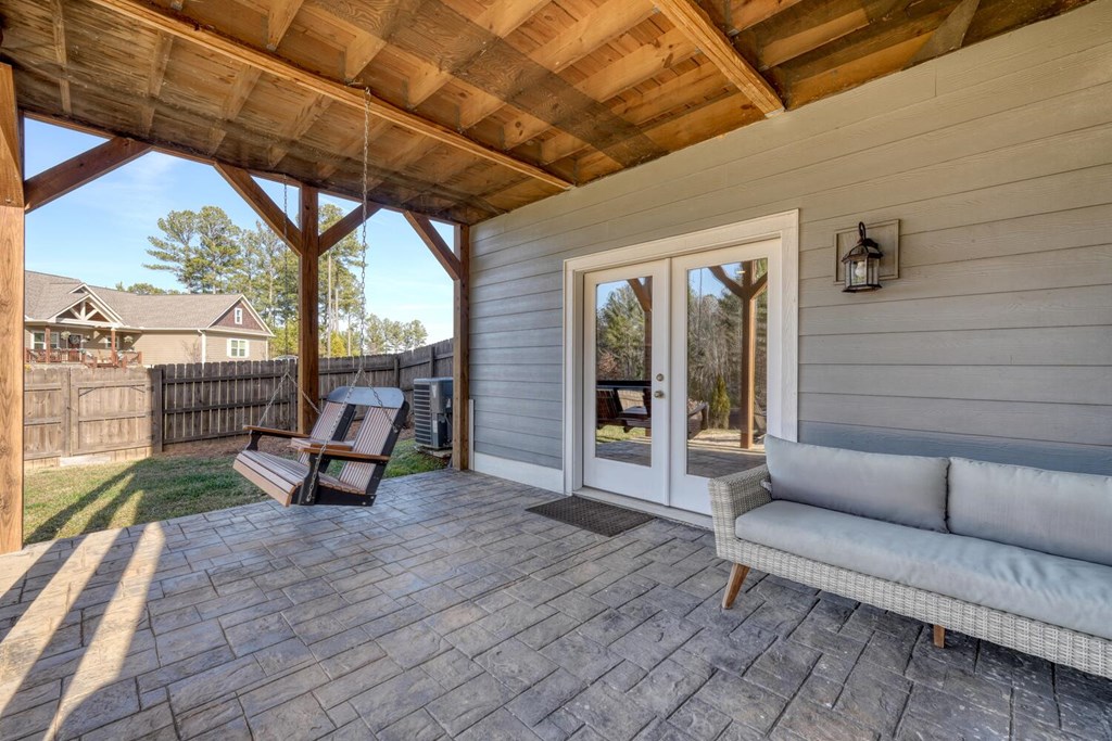 161 Loop Lane Blairsville, GA 30512 - Photo 42 of 67 a view of a patio with couches and potted plants with sky view