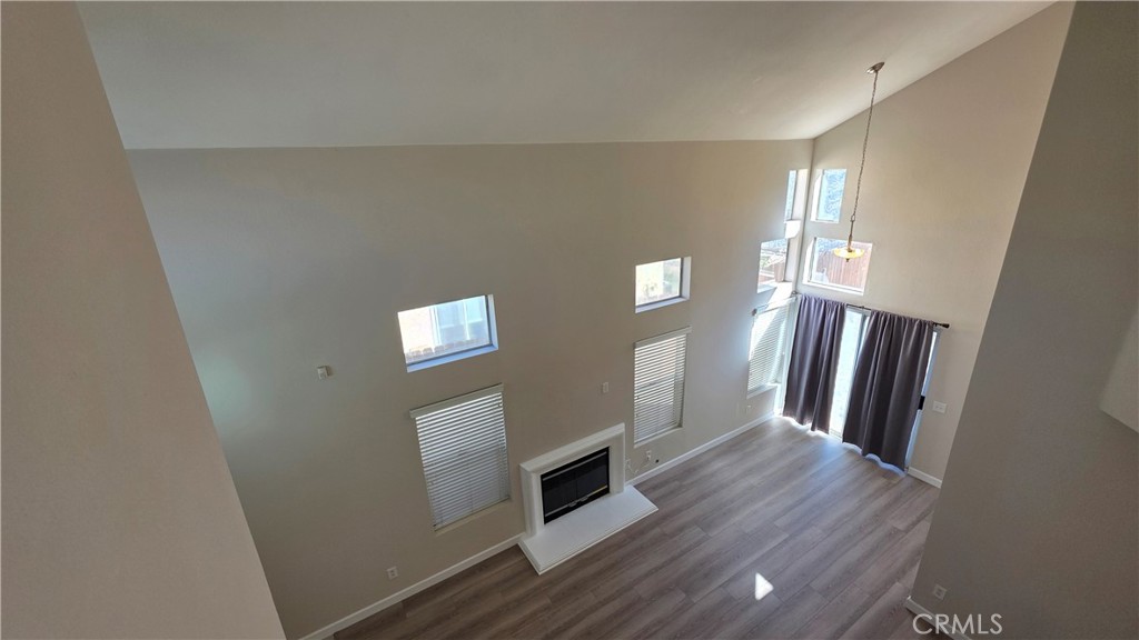 15577 Castellion Road Fontana, CA 92337 - Photo 19 of 38 2nd floor hallway overlooking living room