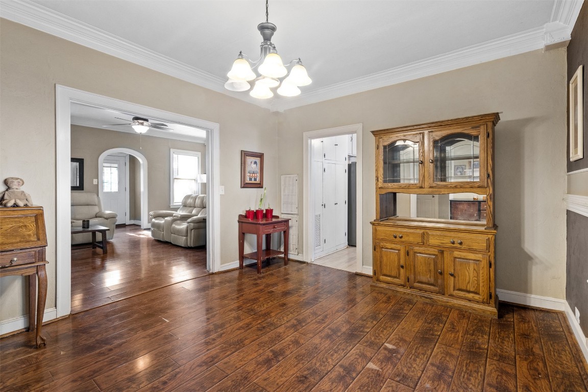 205 Jephson Street Alvin, TX 77511 - Photo 16 of 40 a view of a livingroom with furniture cabinet and wooden floor