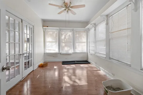 a view of an empty room and window