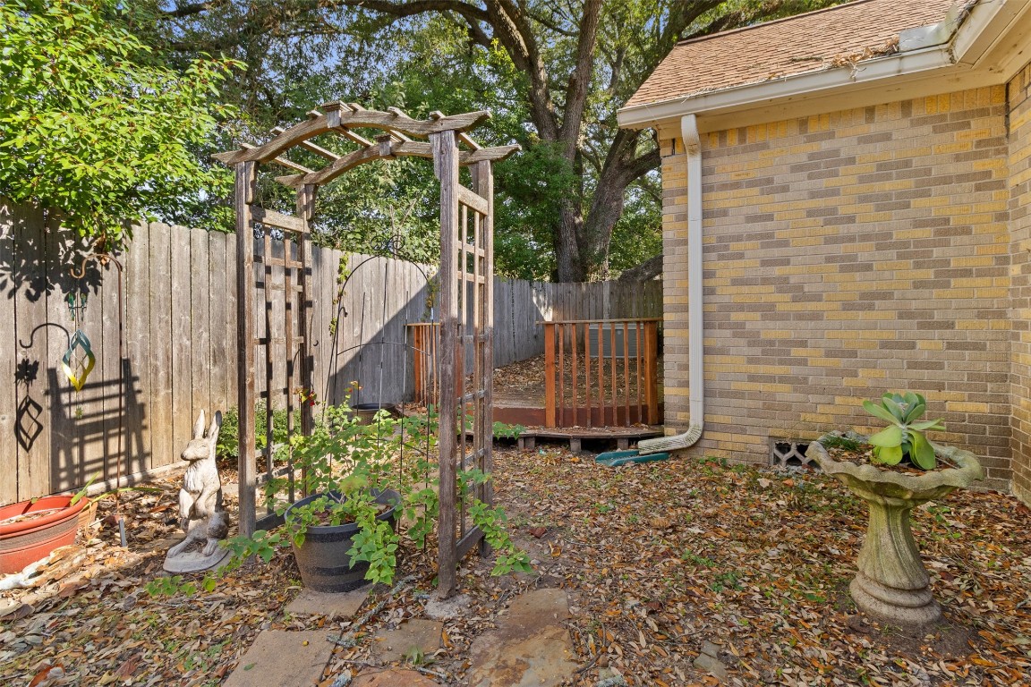 205 Jephson Street Alvin, TX 77511 - Photo 25 of 40 a view of a pathway of a house
