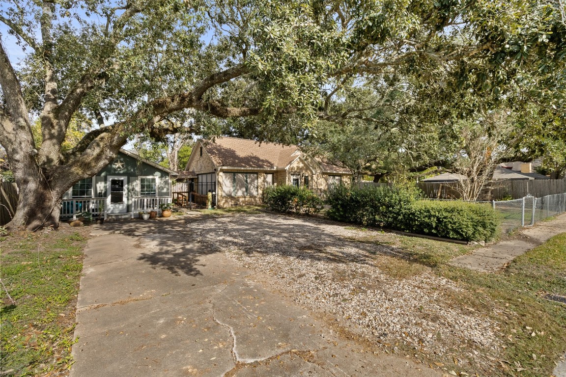 205 Jephson Street Alvin, TX 77511 - Photo 27 of 40 a view of a house with a tree