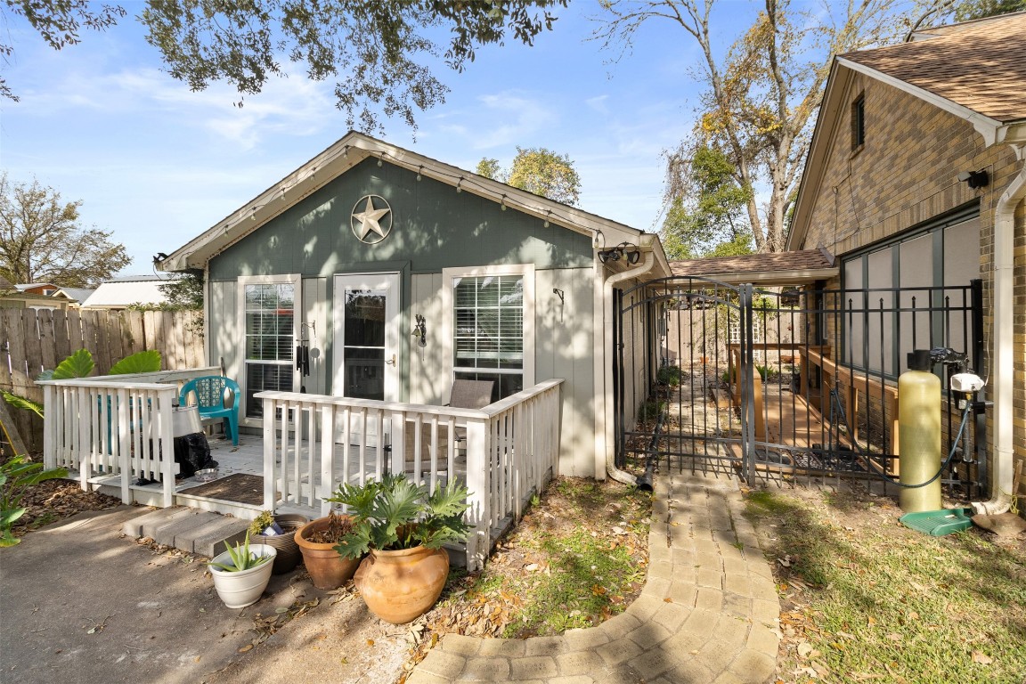 205 Jephson Street Alvin, TX 77511 - Photo 28 of 40 a front view of a house with a garden
