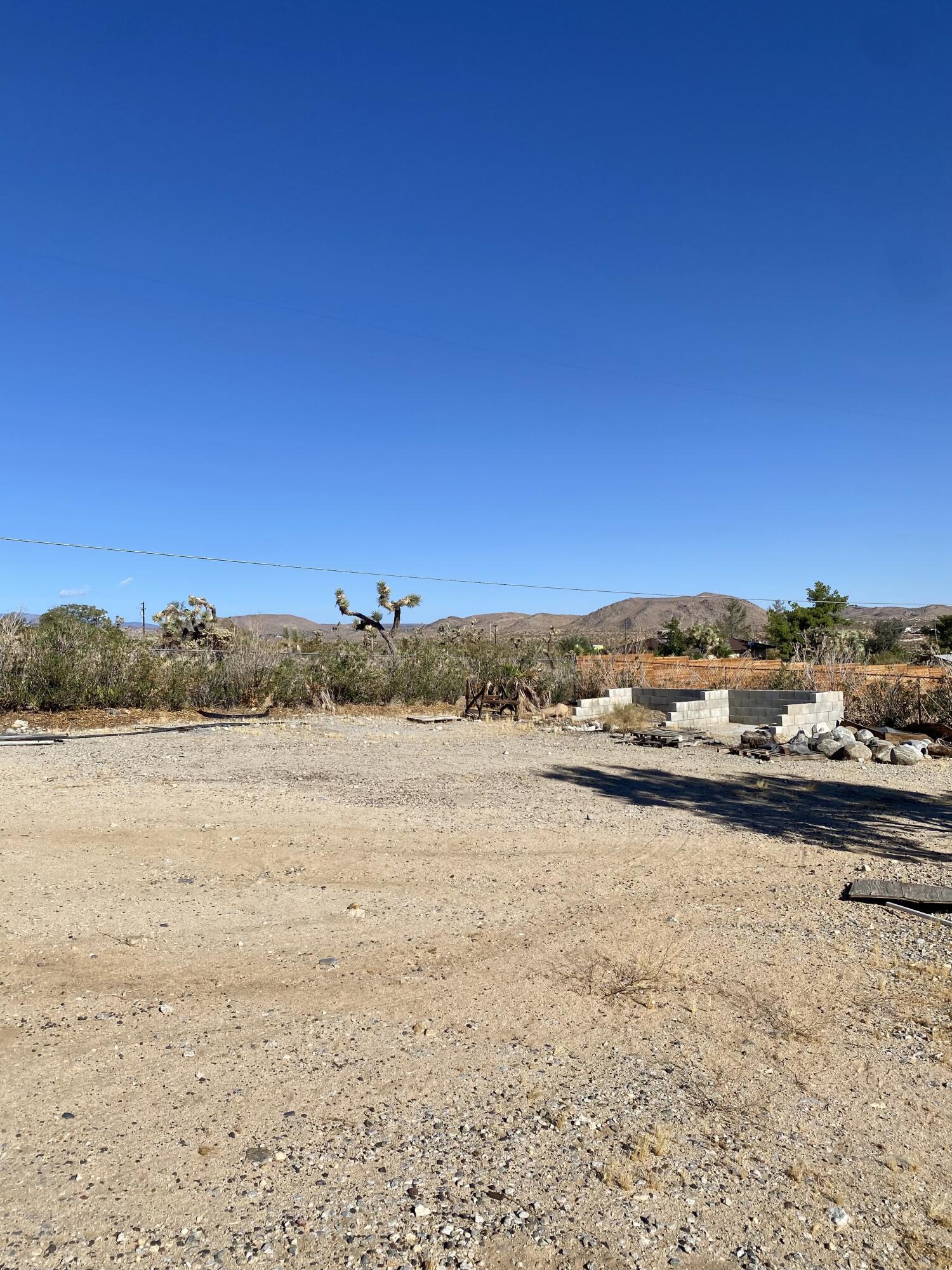 6784 Outpost Road Joshua Tree, CA 92252 - Photo 18 of 22 a view of an ocean and beach