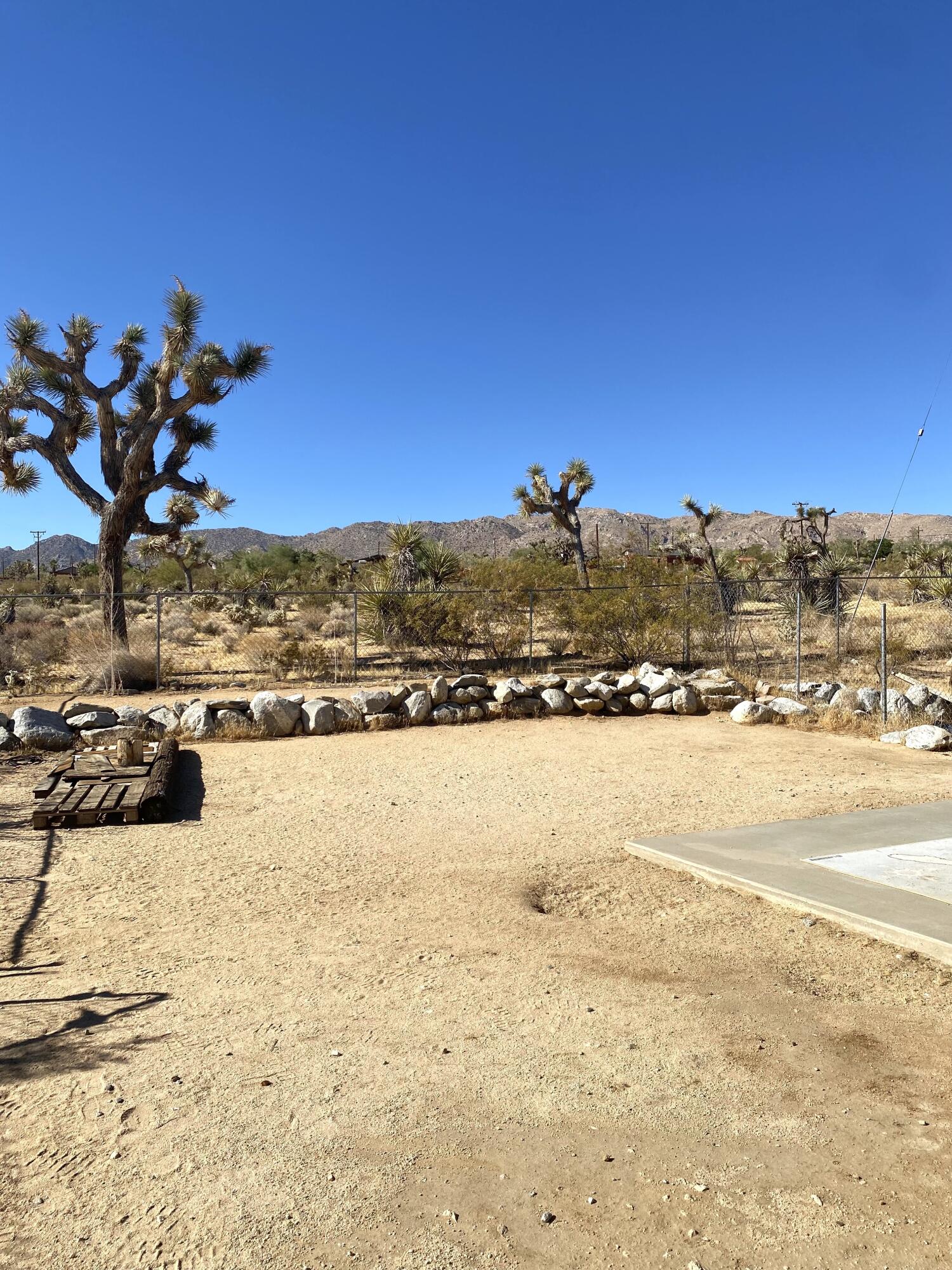 6784 Outpost Road Joshua Tree, CA 92252 - Photo 19 of 22 a view of an ocean and beach