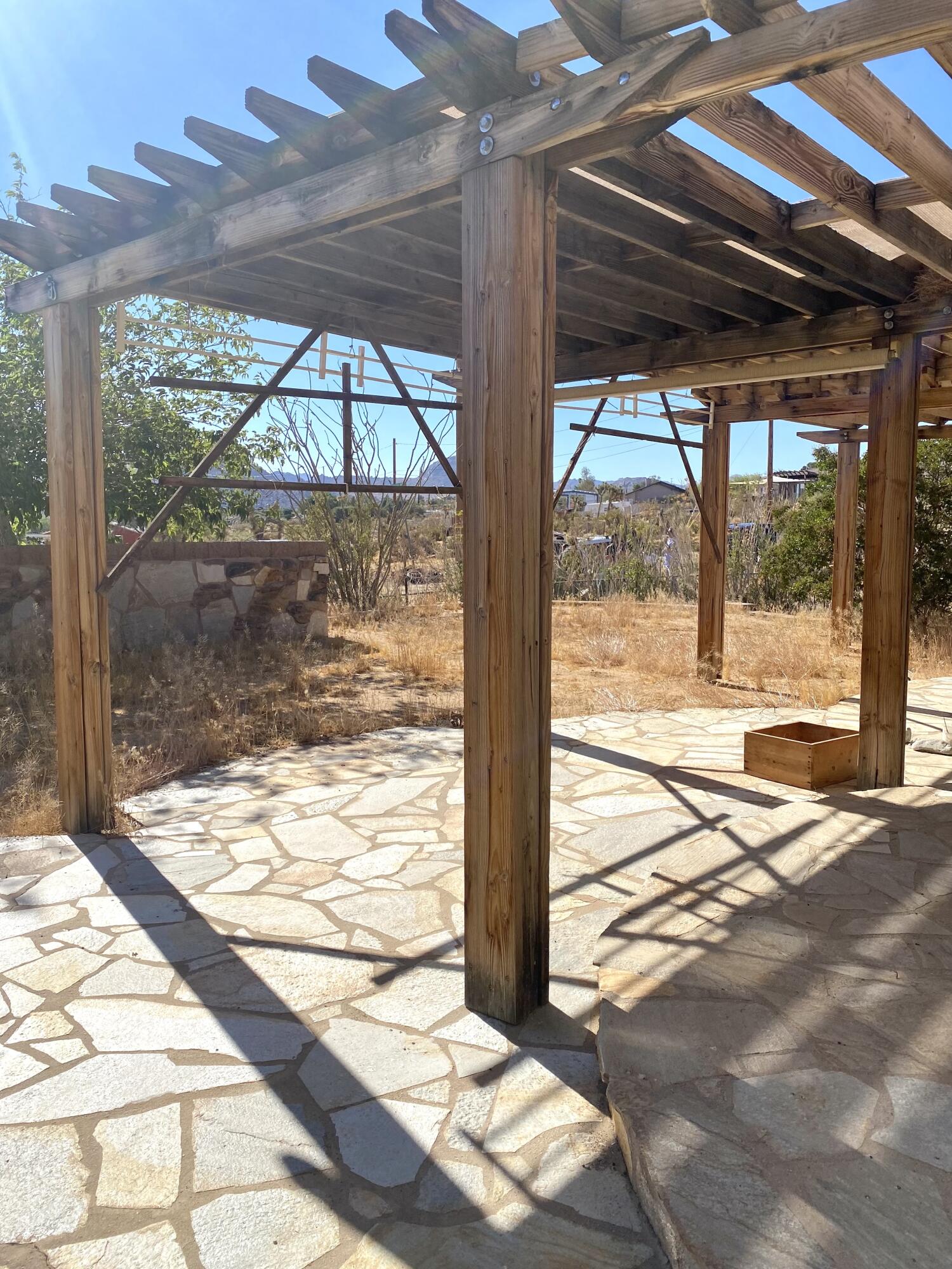 6784 Outpost Road Joshua Tree, CA 92252 - Photo 21 of 22 a view of a porch