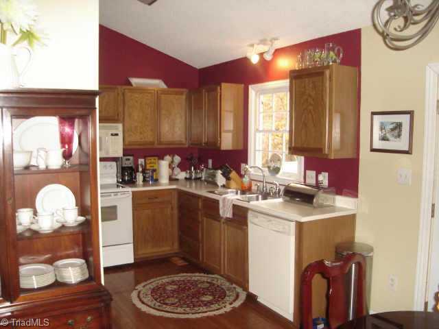 5406 Running Mead Road Pleasant Garden, NC 27313 - Photo 3 of 9 Other. What a beautiful Kitchen with oak cabinets & floor plus a pantry for extra storage.