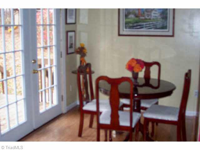 5406 Running Mead Road Pleasant Garden, NC 27313 - Photo 7 of 9 Other. The dining room has beautiful hardwood floors and new atrium doors to the deck.