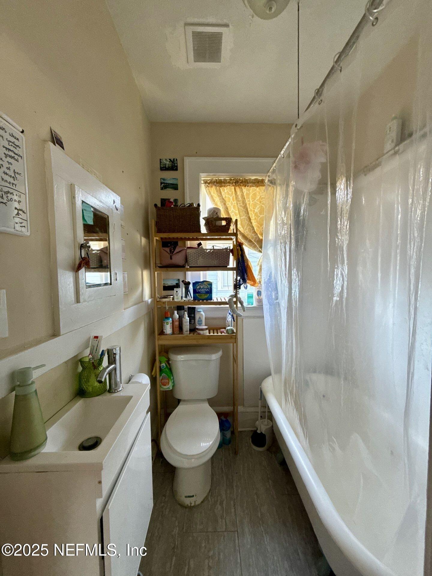 2850 Post Street Jacksonville, FL 32205 - Photo 14 of 20 a bathroom with a sink toilet and shower