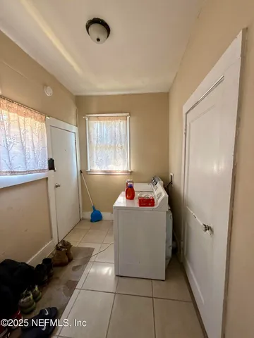 a living room with a couch and a table