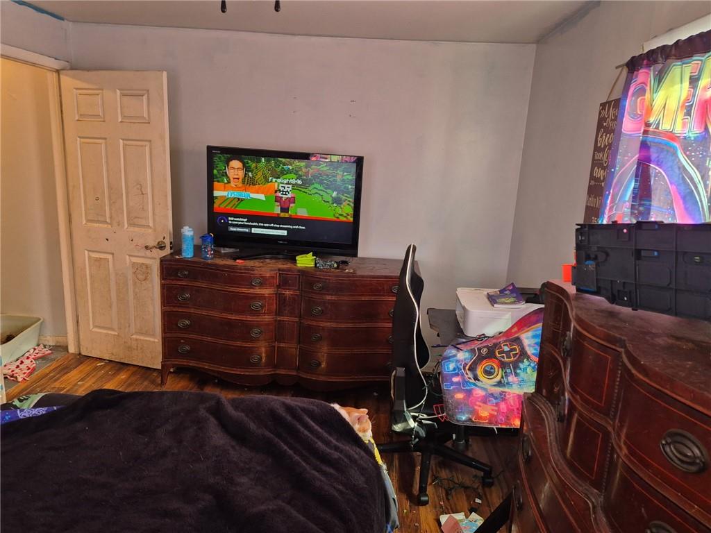 1013 Henry Street Rostraver Township, PA 15012 - Photo 15 of 46 a bedroom with a bed and flat screen tv