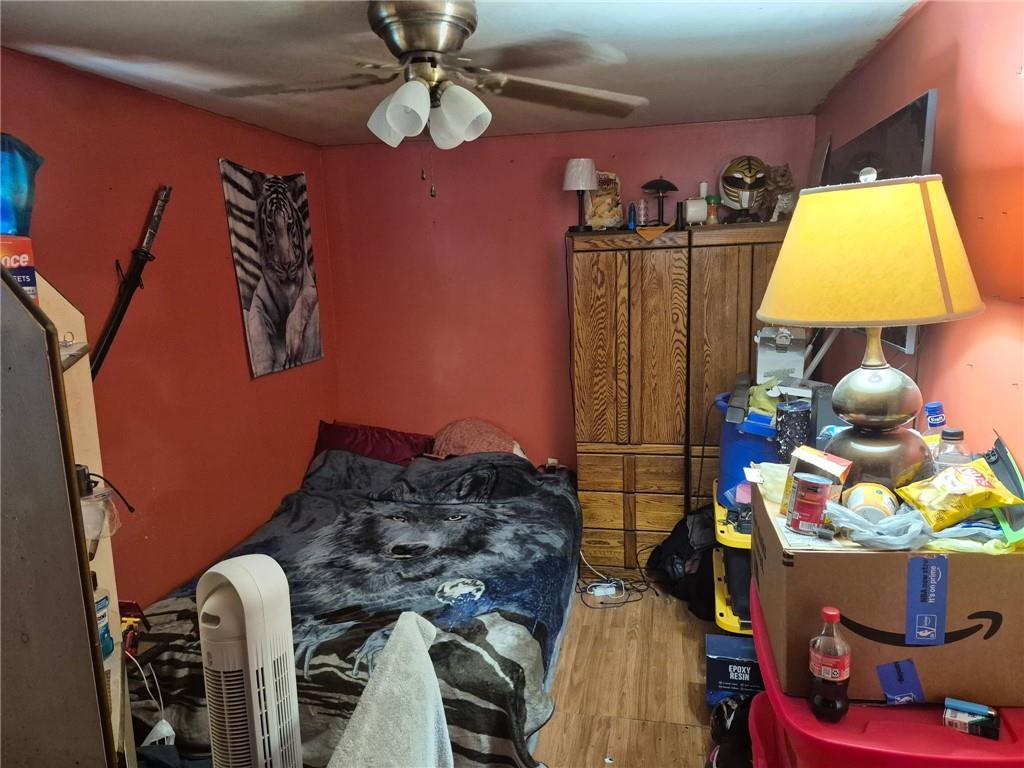 1013 Henry Street Rostraver Township, PA 15012 - Photo 27 of 46 a room with lots of different colored cloths