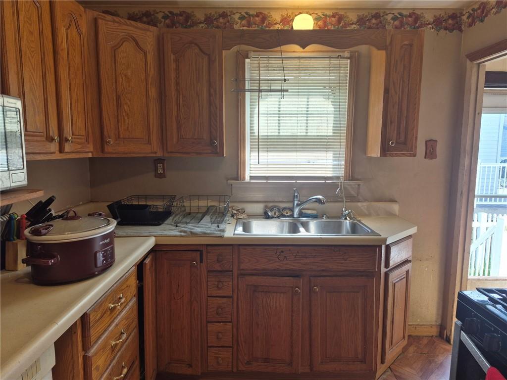 1013 Henry Street Rostraver Township, PA 15012 - Photo 31 of 46 a kitchen with a sink and cabinets