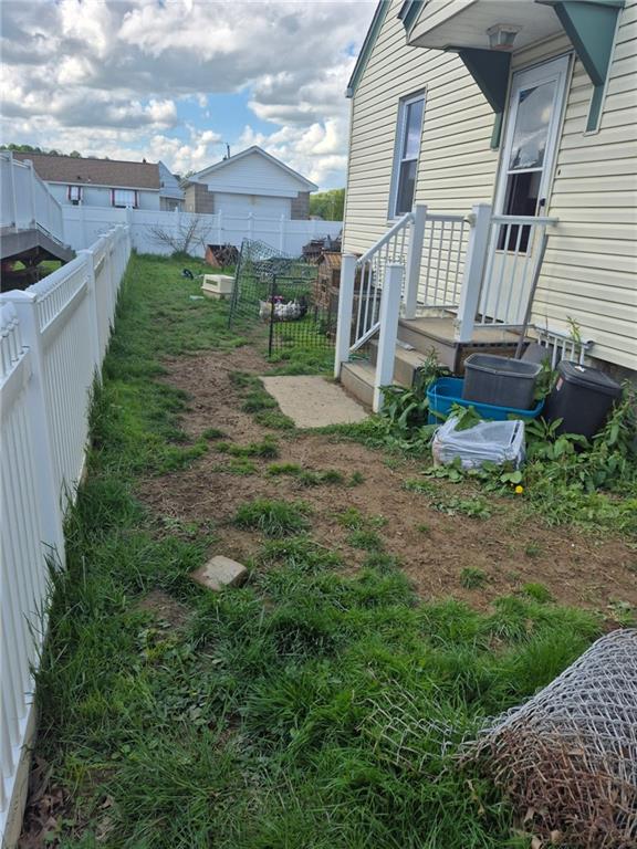 1013 Henry Street Rostraver Township, PA 15012 - Photo 40 of 46 a view of a house with a yard