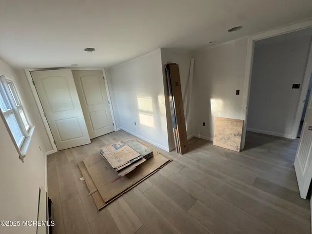 a view of kitchen with furniture and window