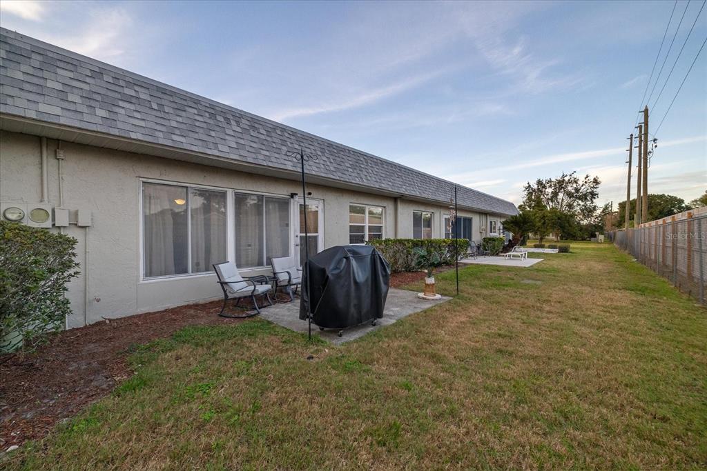 3230 Teeside Drive New Port Richey, FL 34655 - Photo 25 of 32 a front view of a house with garden