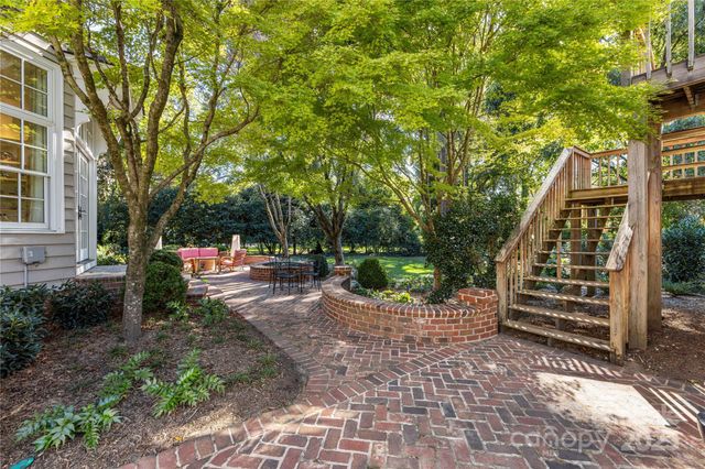 a view of a back yard with green space