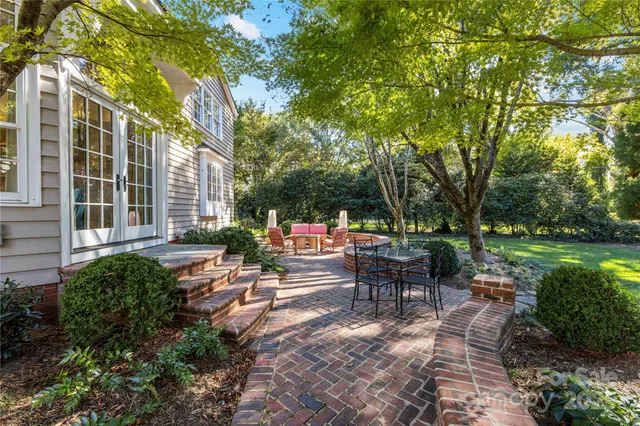 a garden view with a sitting space