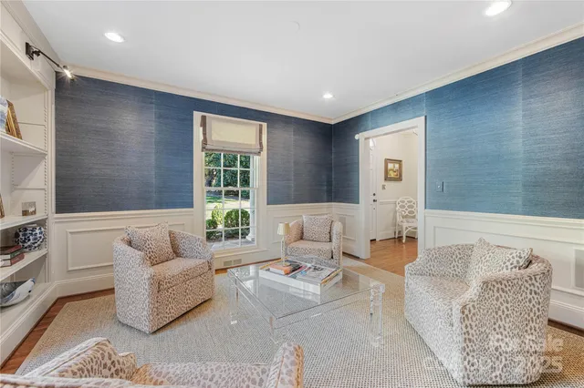 a living room with furniture and windows