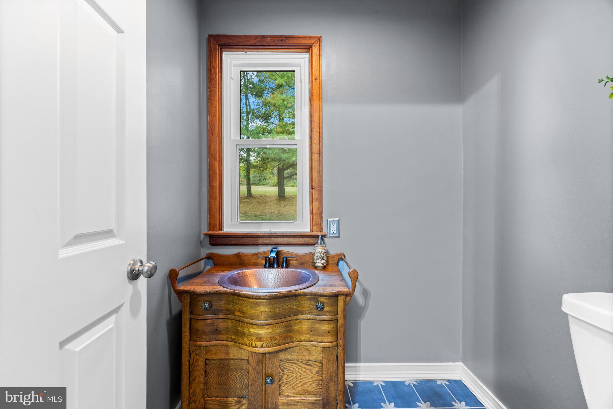 1763 Gablehammer Road Westminster, MD 21157 - Photo 11 of 51 a bathroom with a sink and a window