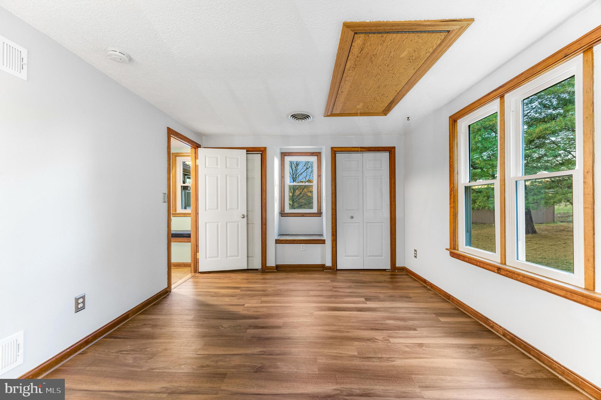 1763 Gablehammer Road Westminster, MD 21157 - Photo 24 of 51 a view of an empty room with wooden floor and a window