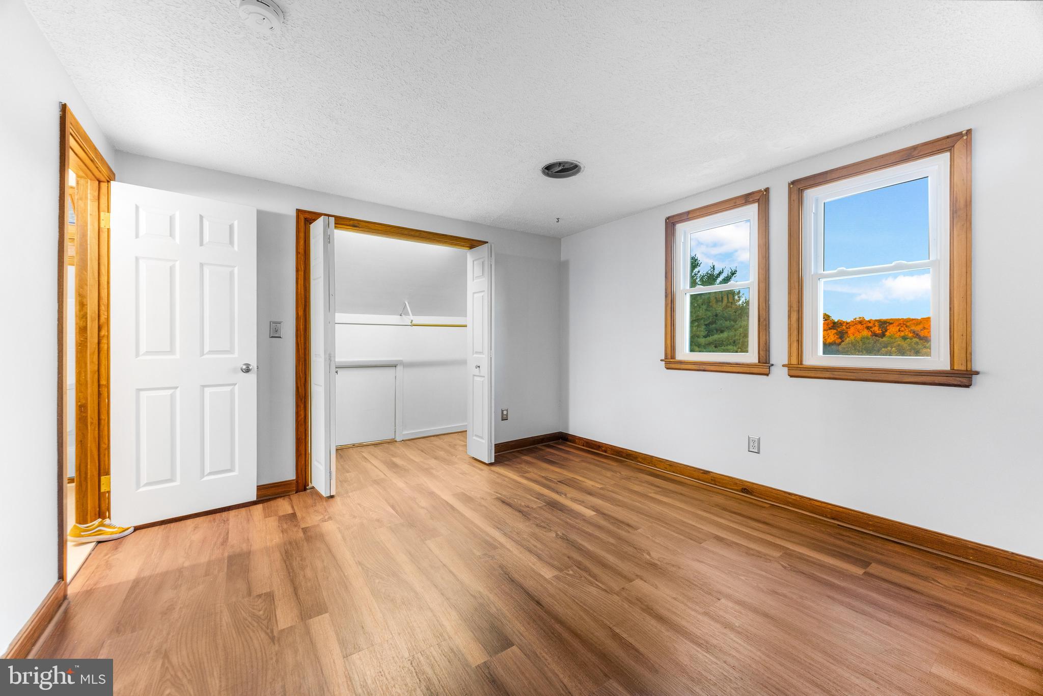 1763 Gablehammer Road Westminster, MD 21157 - Photo 27 of 51 a view of an empty room with wooden floor and a window