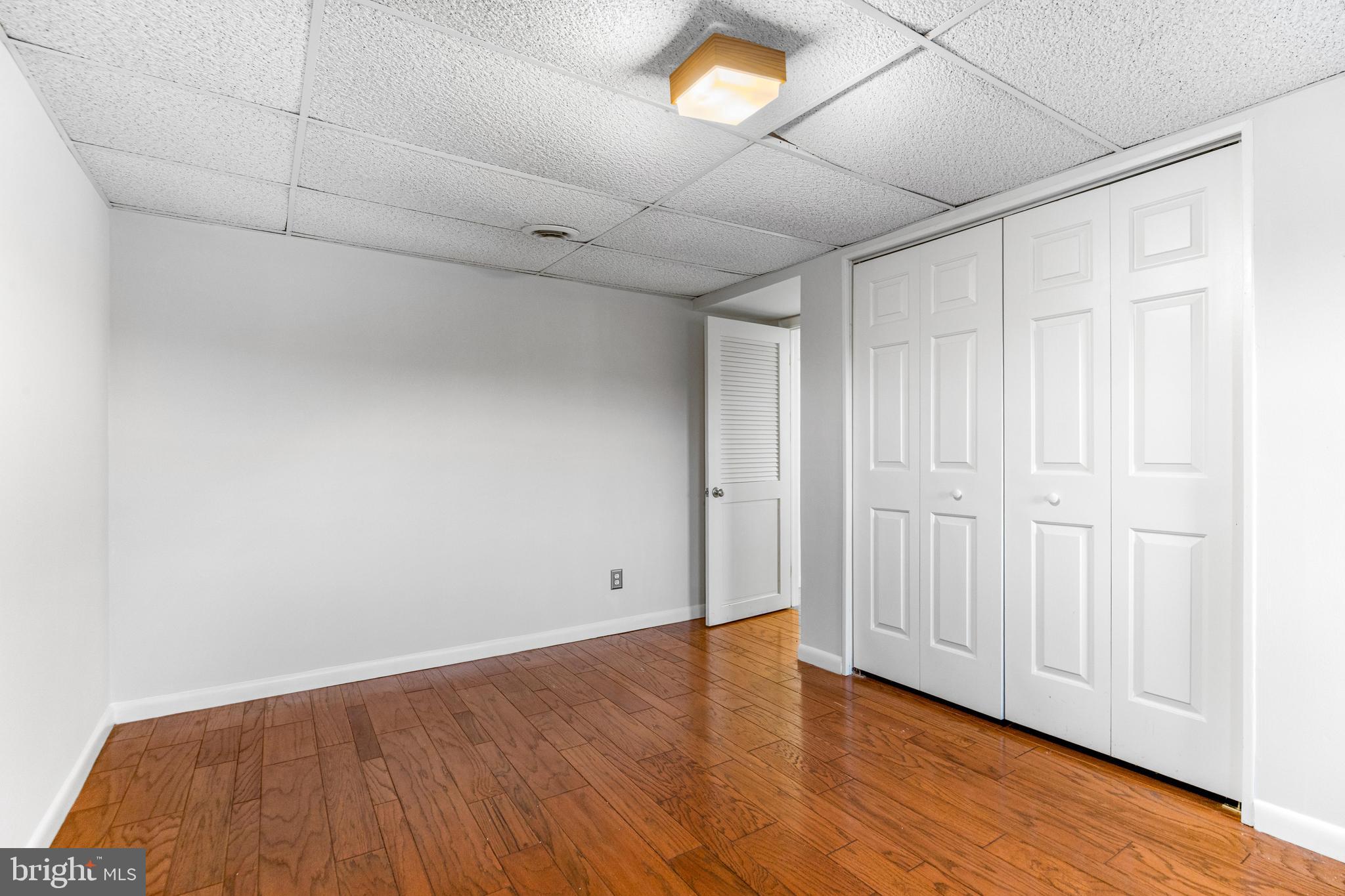 1763 Gablehammer Road Westminster, MD 21157 - Photo 31 of 51 a view of an empty room with wooden floor